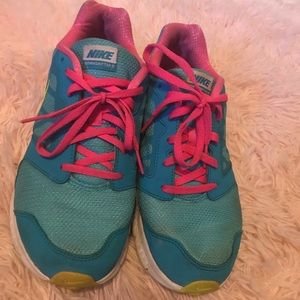 Blue nikes with lime swish